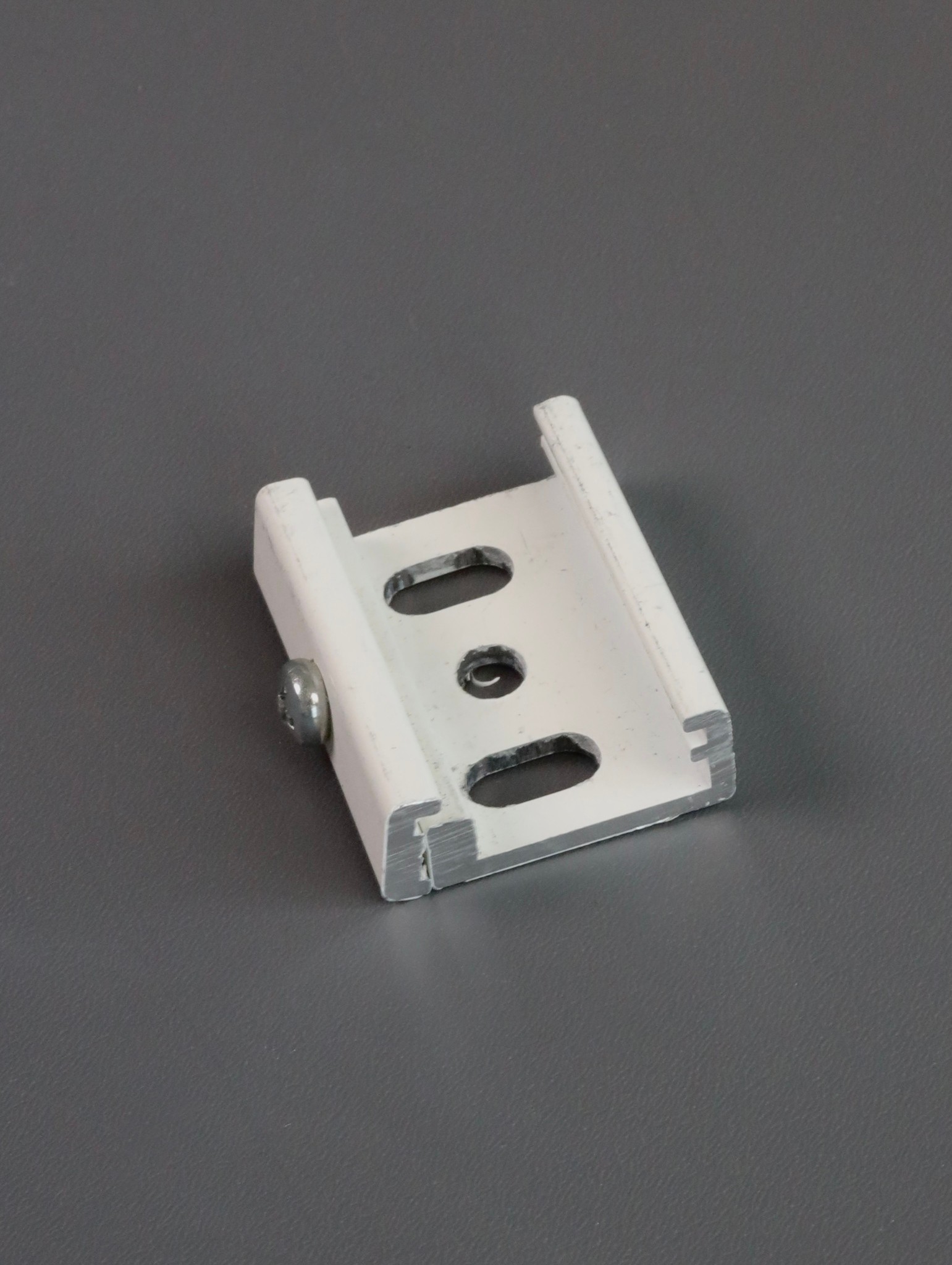 Скоба крепления для шинопровода белая Kanlux Bsl 10012